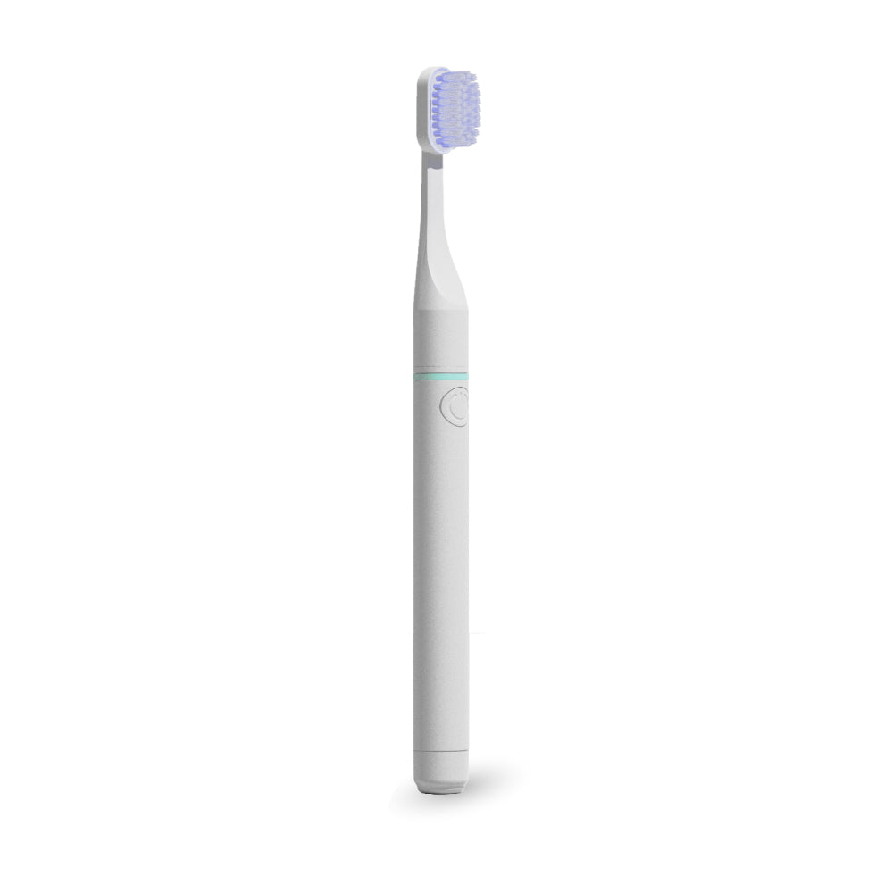 Bioelektrinis dantų šepetėlis Tromatz Pro, baltame fone.