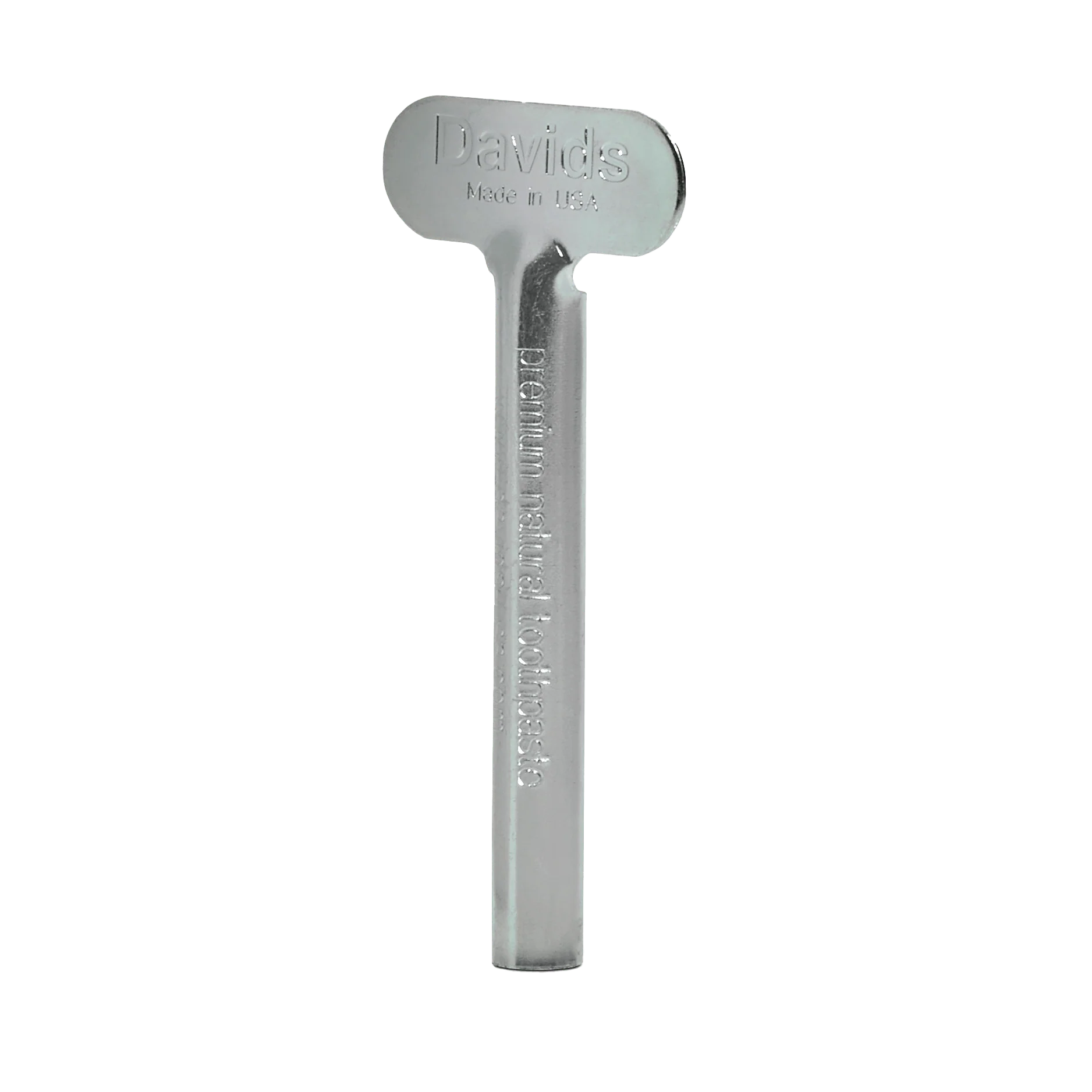 Davids spaustukas metalinėms dantų pastos tūbelėms, be fono.